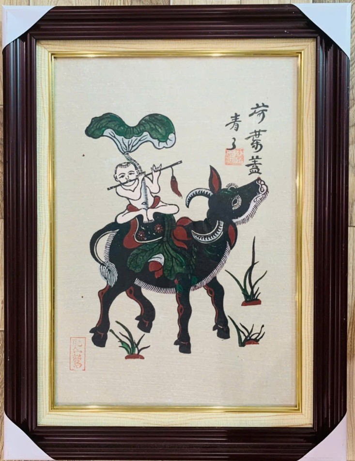 Bé cưỡi trâu thổi sáo